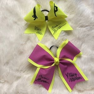 2 cheer bows signed by Gabi Butler & Keira Nowlin